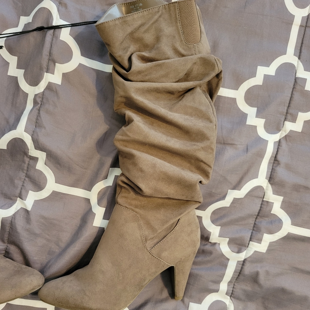 Boots with heel.